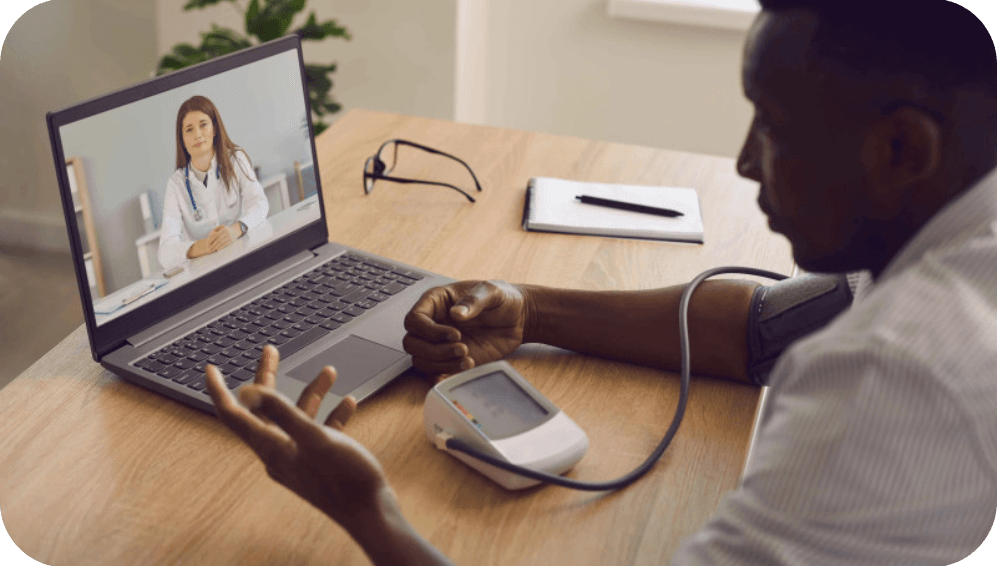 Doctor-provides-Remote-Patient-Monitoring-through-laptop