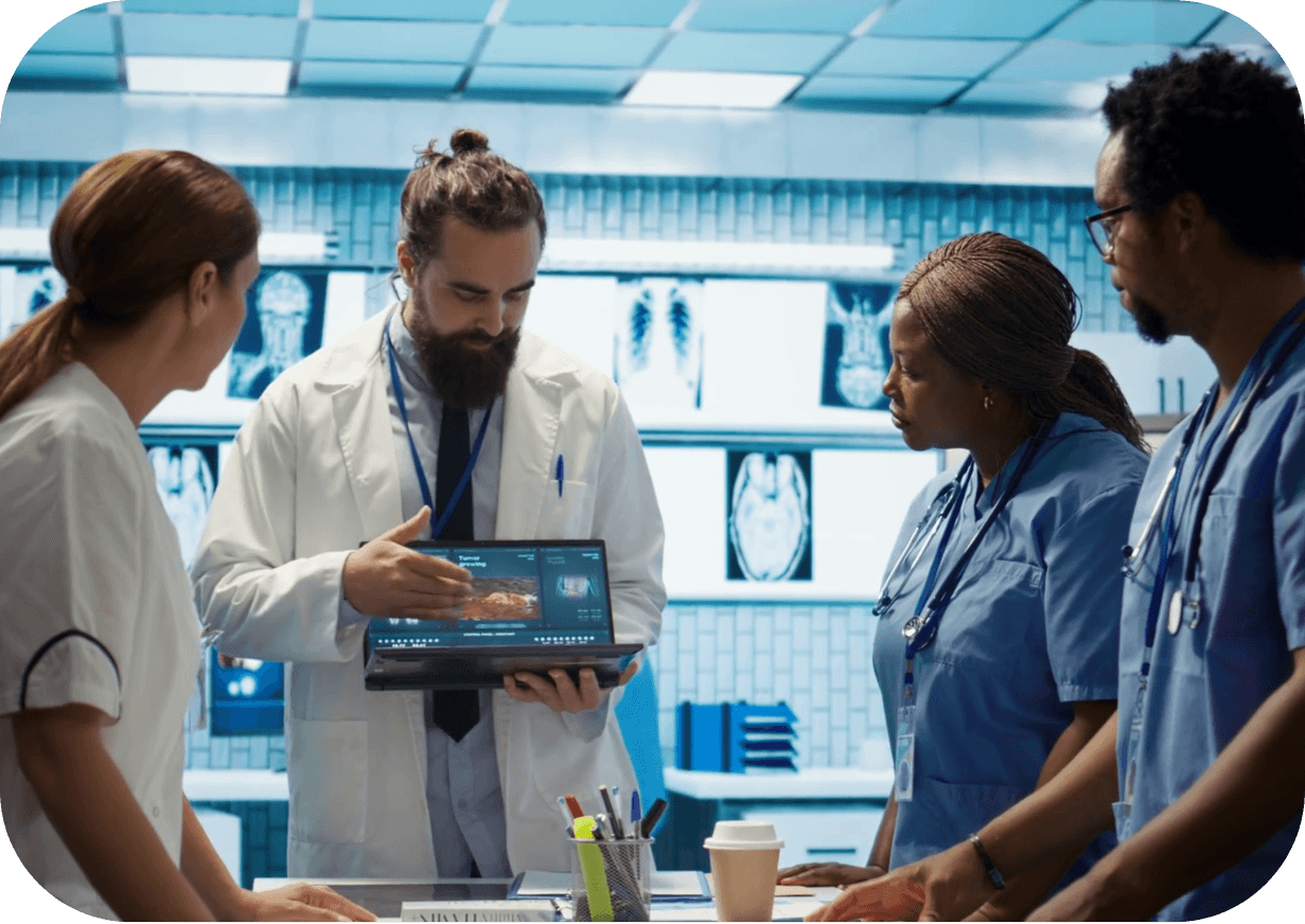 Doctor-shows-Chronic-Care-Management-dashboard-to-team