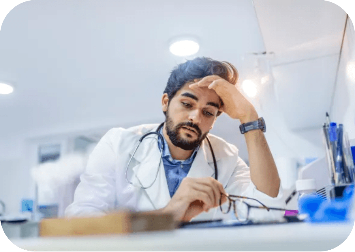 Doctor-stressed-while-viewing-Electronic-Medical-Record