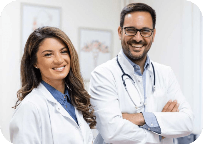Endocrinology-Two-happy-doctors-smiling-confidently
