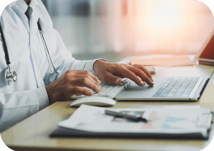 Gastroenterology-Doctor-analyzes-charts-on -laptop.
