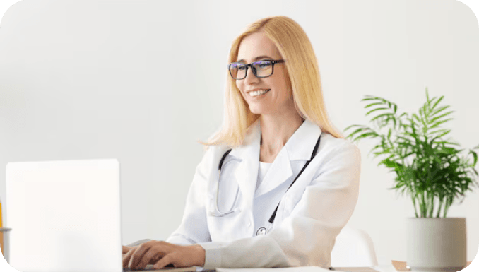 Pulmonology-Doctor-happily-works-on-laptop.