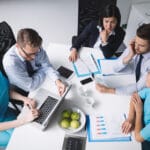 Medical-professionals-and-executives-in-a-focused-meeting.