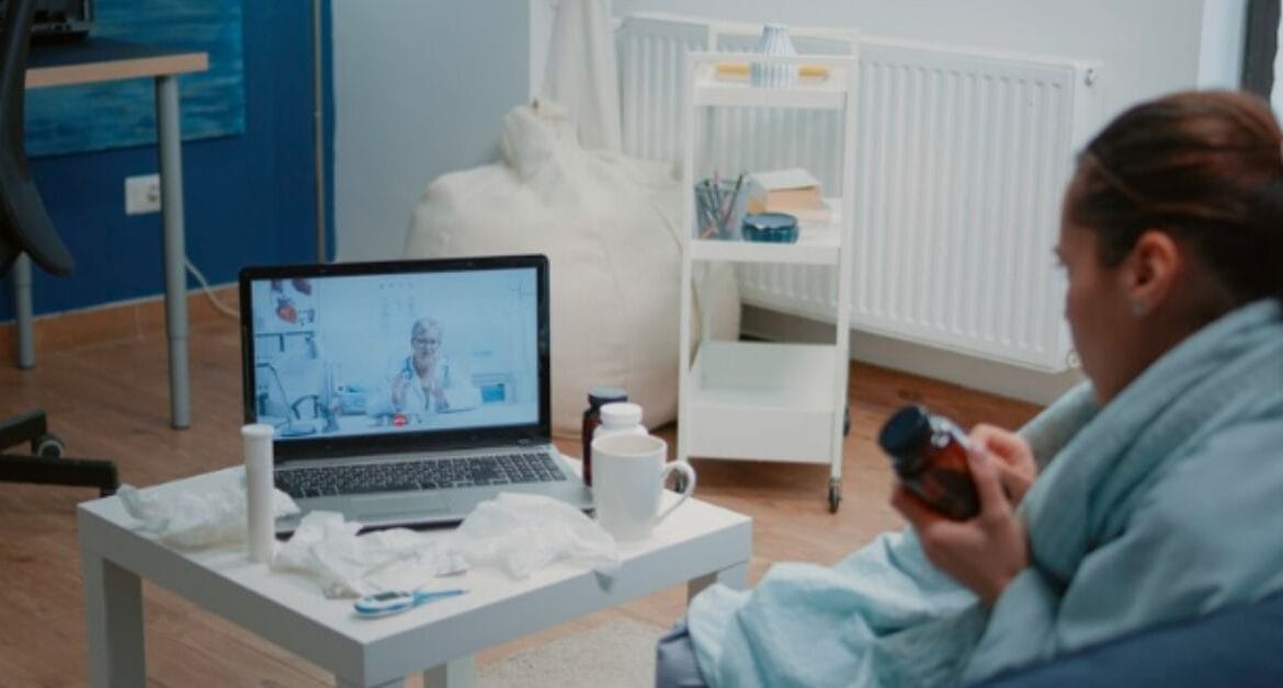 woman-using-remote-therapeutic-monitoring-teleconsultation